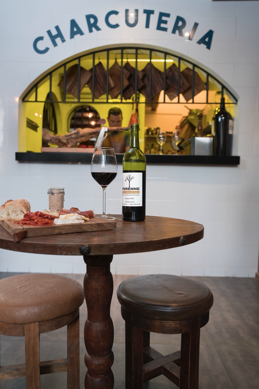 Red wine enjoyed with food in a social dining setting