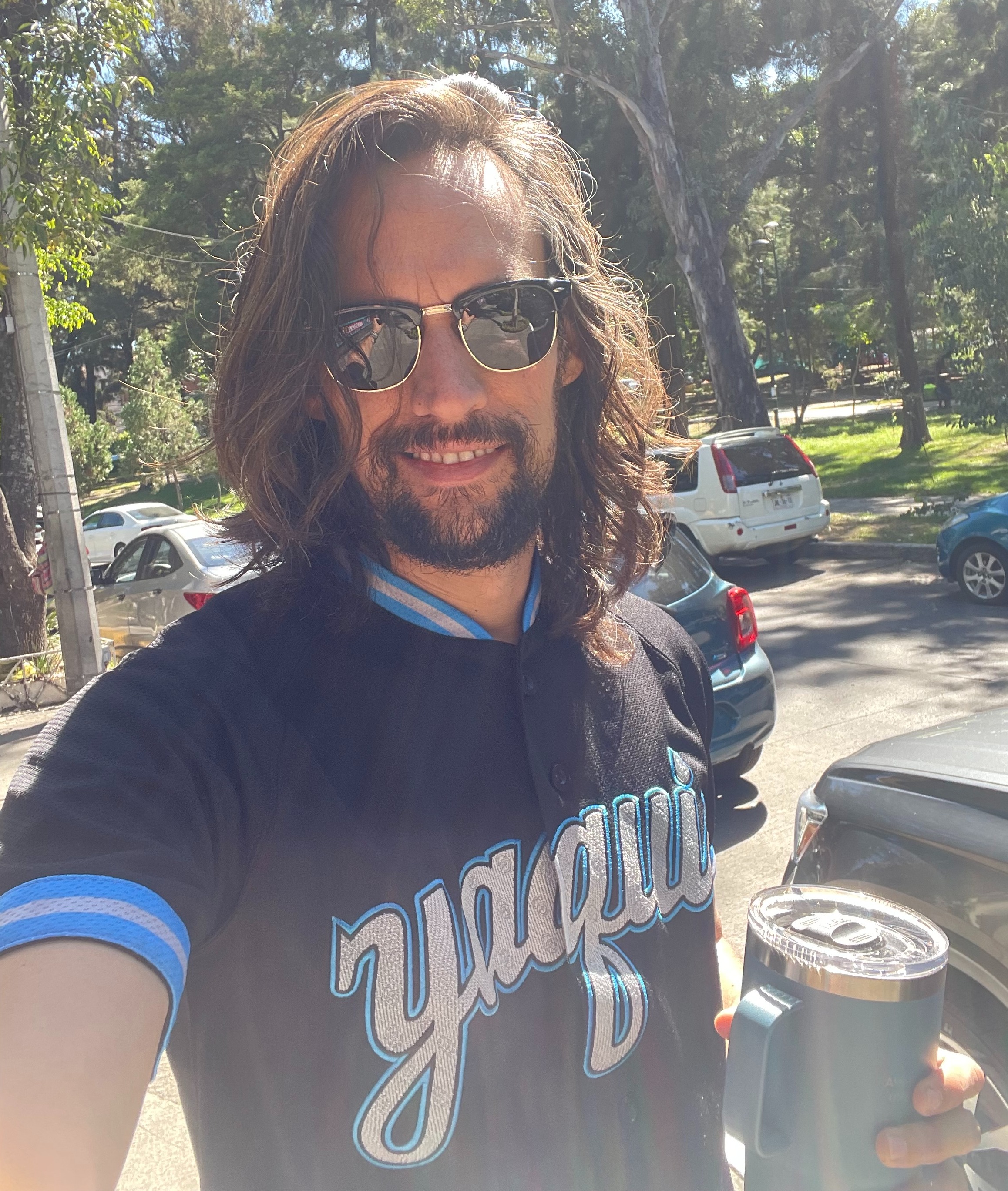 Portrait of the cinematographer Alejandro Roa smiling in his hometown of Guadalajara, Mexico.